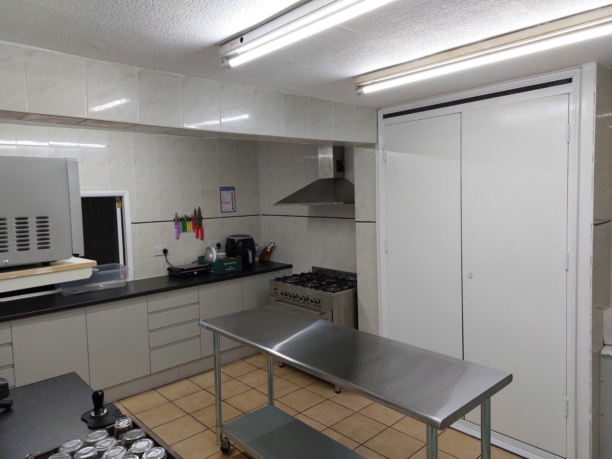 kitchen and youth space renovation for community impact in bolton